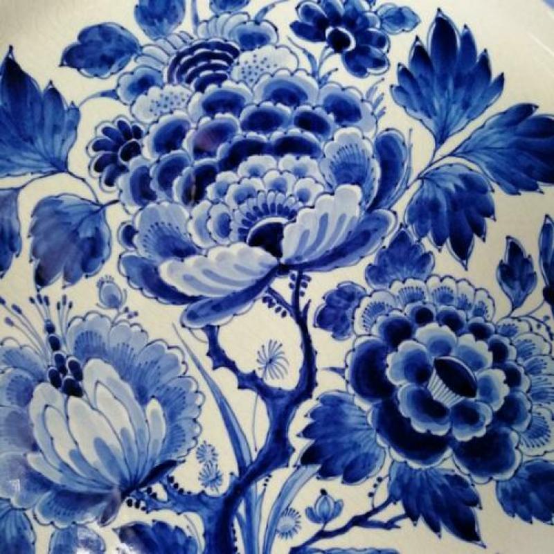 Groot Delfts Blauw bord. (beschadigd)
