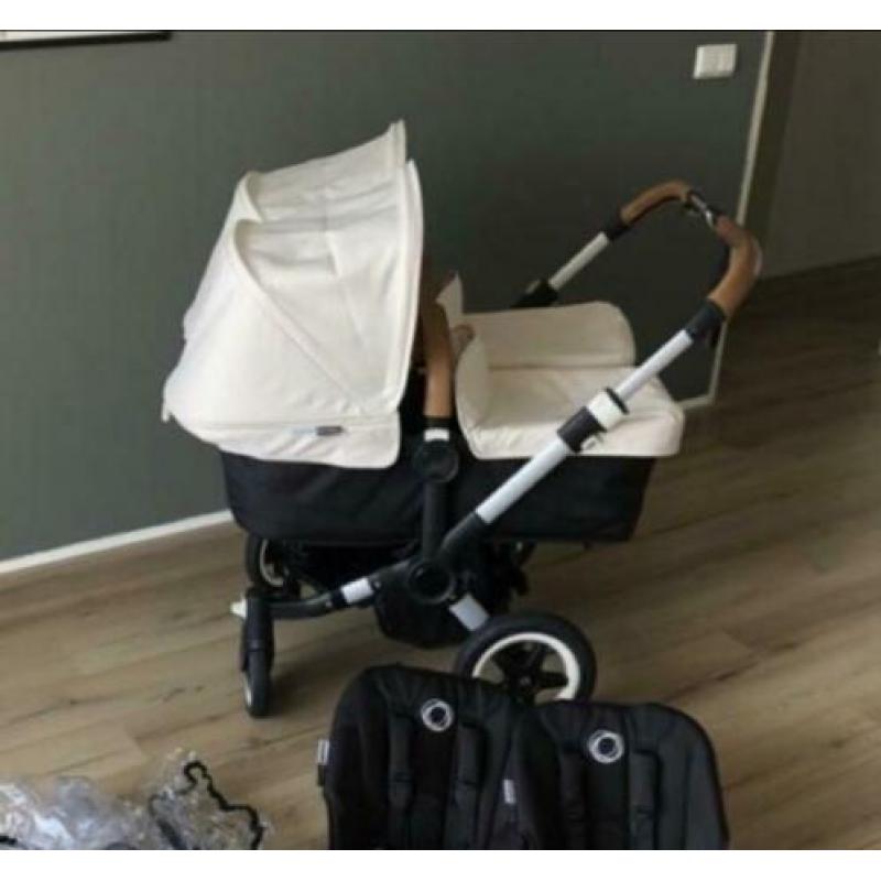 Bugaboo donkey tweeling kinderwagen met maxicosis