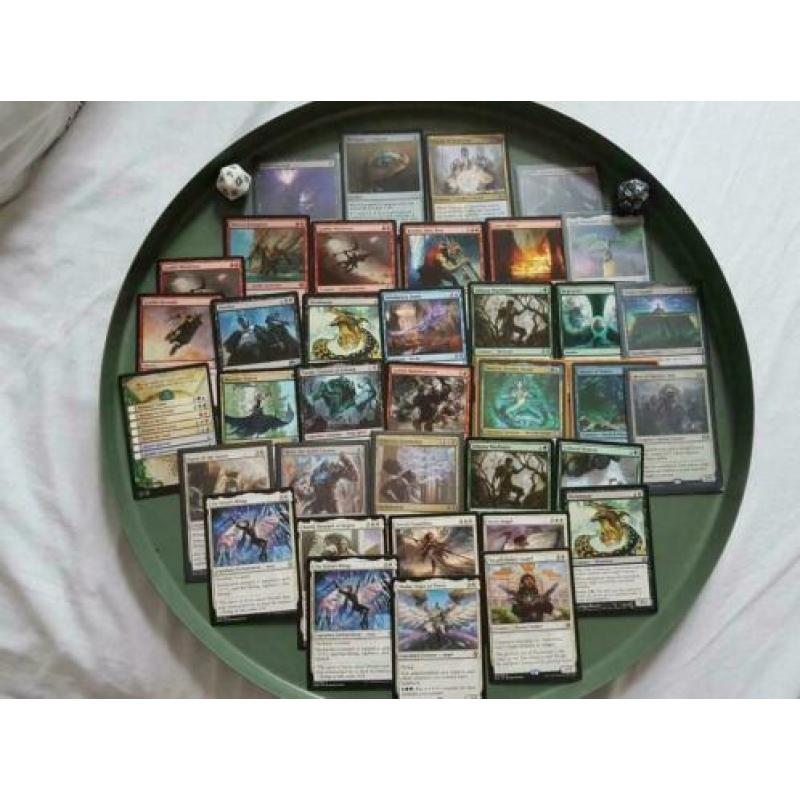 A mixture of Magic the Gathering cards & 2 life dice!