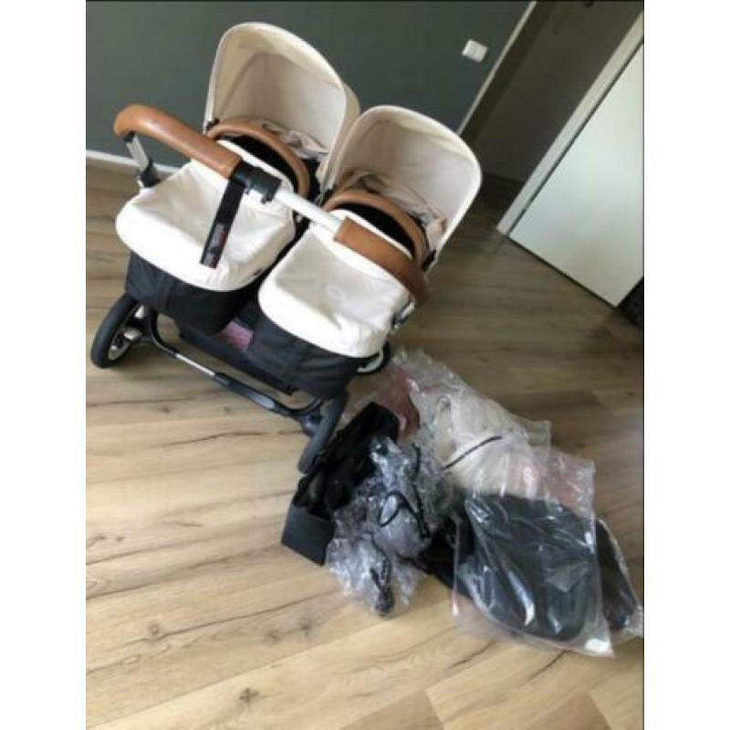 Bugaboo donkey tweeling kinderwagen met maxicosis