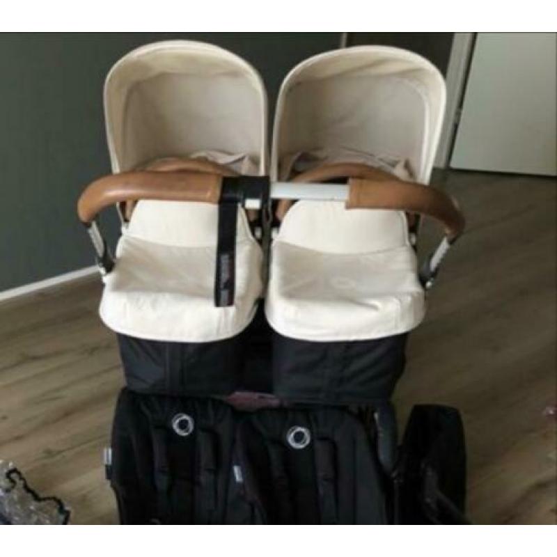 Bugaboo donkey tweeling kinderwagen met maxicosis