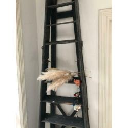 Vintage oude houten schilderstrap