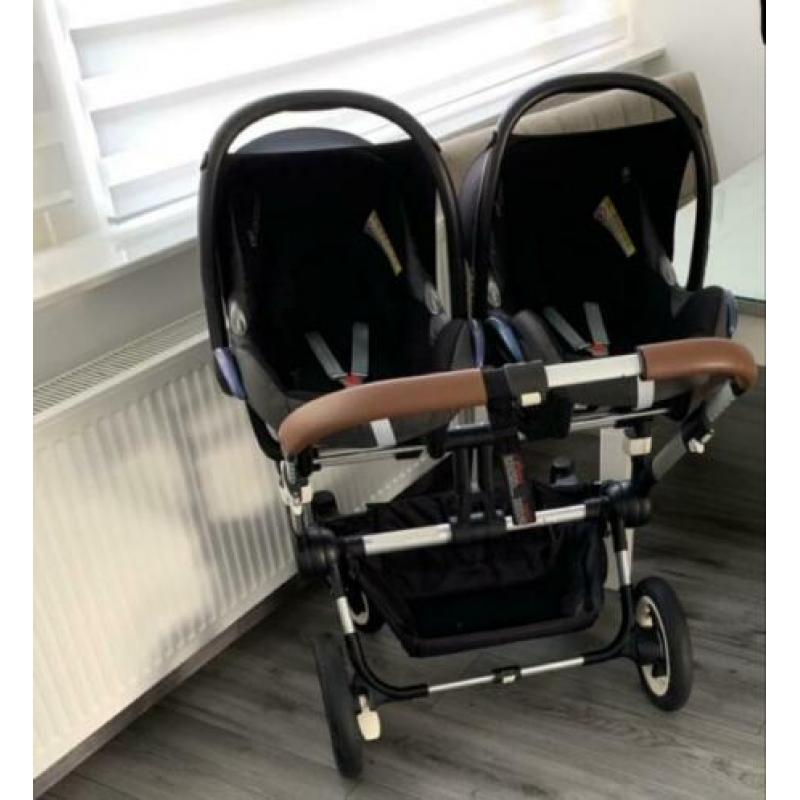 Bugaboo donkey tweeling kinderwagen met maxicosis