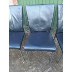 4 stuks zwart leren eethoek stoelen