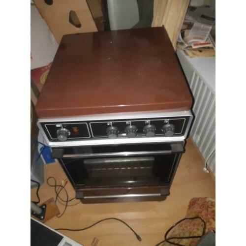 Gasfornuis met oven hoog 89 cm breed 51 cm electriche oven