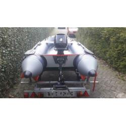 Rubberboot met 6 pk motor en trailer