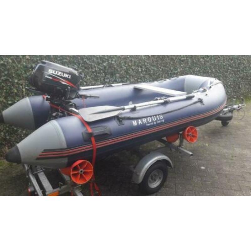 Rubberboot met 6 pk motor en trailer