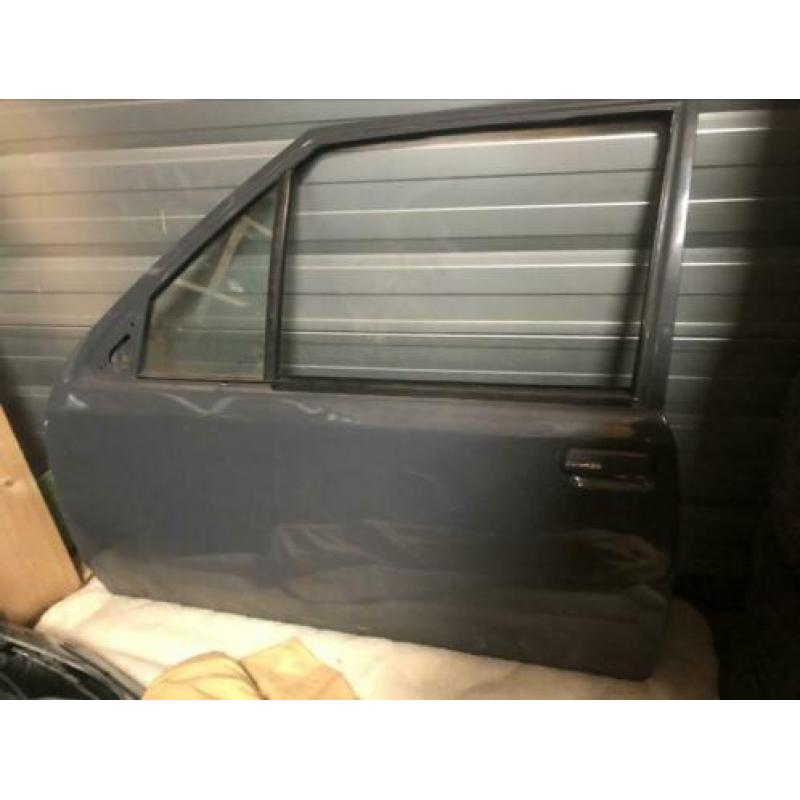 Corsa A motorkap deuren achterklep spatbord