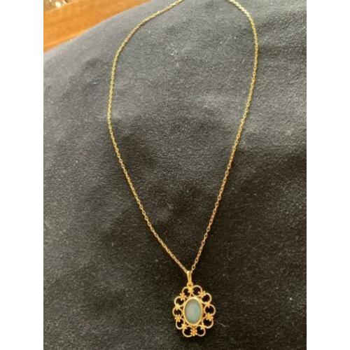 18 karaat gouden ketting JOFISA met hanger zwarte opaal sk