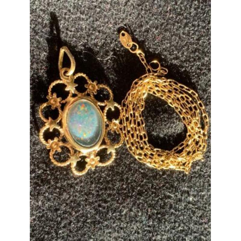 18 karaat gouden ketting JOFISA met hanger zwarte opaal sk
