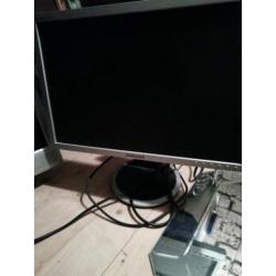 Twee computer schermen