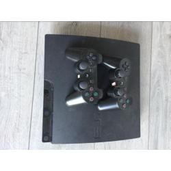 Playstation 3 console met 2 controllers en wat games