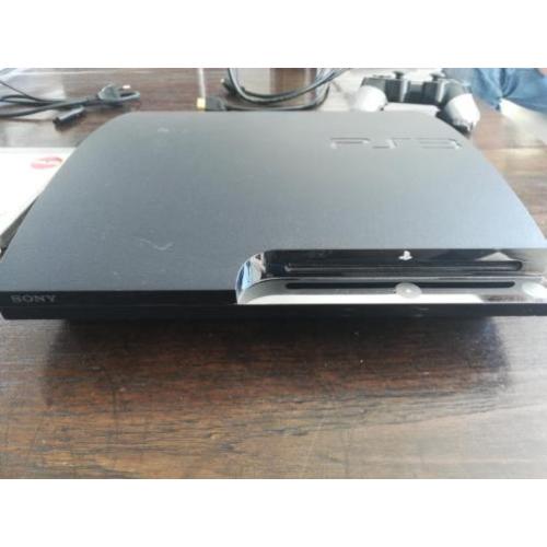 Playstation 3 Slim 160 GB met kabels en 4 spellen