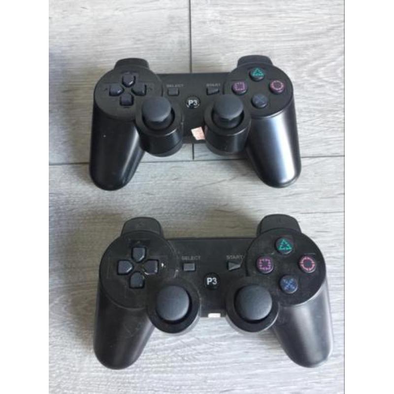 Playstation 3 console met 2 controllers en wat games